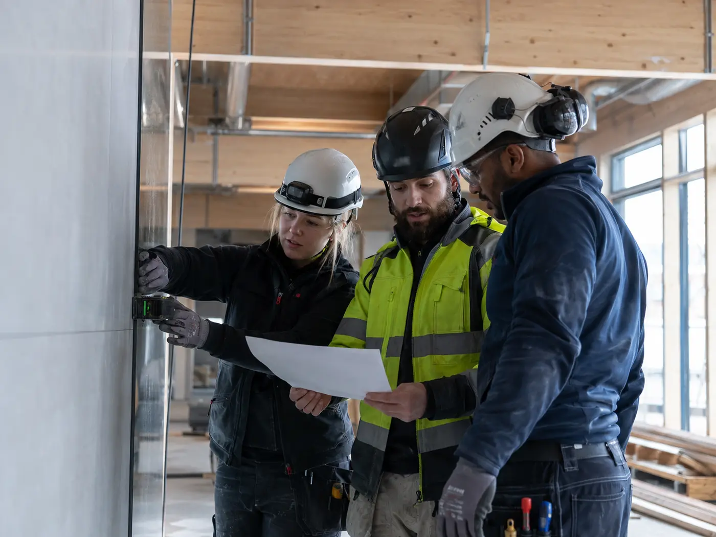 Skilled construction workers collaborating on site